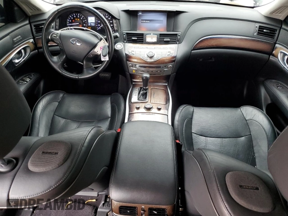 2015 Infiniti Q70 z VIN JN1BY1PP4FM600745, wystawiony jako Copart lot #44411015 z przebiegiem 80 509 mil mil oraz Szkoda całkowita • Salvage title. Historia ofert i sprzedaży dostępna na DreamBid. Obrazek 8.