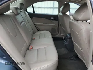 2012 Ford Fusion Hybrid с VIN 3FADP0L32CR184712, выставлен на аукционе Copart как лот 58517555 с пробегом 196 644 миль миль и Списание • Salvage title. История ставок и продаж доступна на DreamBid. Изображение 10.