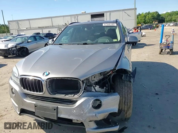 2015 BMW X5 xDrive35d z VIN 5UXKS4C50F0N08784, wystawiony jako Copart lot #57348185 z przebiegiem 168 452 mil mil oraz Szkoda całkowita • Salvage title. Historia ofert i sprzedaży dostępna na DreamBid. Obrazek 14.