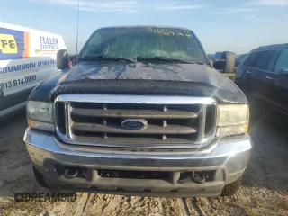 2003 Ford F-350 with VIN 1FTSW30PX3EC59706, listed as a Copart auction lot 74680424 with 155,093 mi miles and Salvage title. Bid and sale history available at DreamBid. Image 5.