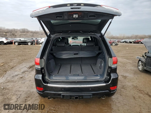 2016 Jeep Grand Cherokee Overland with VIN 1C4RJFCG8GC402339, listed as a Copart auction lot 47553385 with 121,486 mi miles and Salvage title. Bid and sale history available at DreamBid. Image 6.