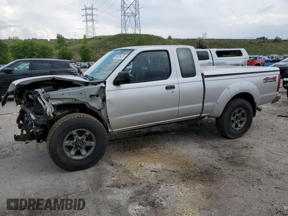 2004 Nissan Frontier XE Desert Runner with VIN 1N6ED26Y44C402138, listed as a Copart auction lot 58828425 with 125,143 mi miles and Salvage title. Bid and sale history available at DreamBid. Image 1.