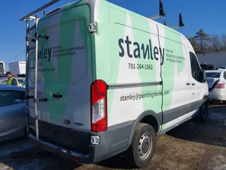 2016 Ford Transit Cargo with VIN 1FTYR1CM7GKA48493, listed as a IAAI auction lot 41363457 with 184,305 mi miles and . Bid and sale history available at DreamBid. Image 4.