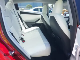 2025 Tesla Model 3 Long Range with VIN 5YJ3E1EA6SF917745, listed as a IAAI auction lot 42533673 with 7,305 mi miles and . Bid and sale history available at DreamBid. Image 8.