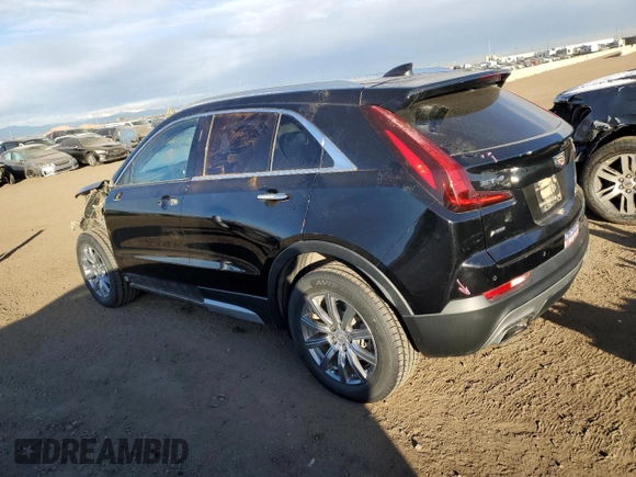 2020 Cadillac XT4 AWD Premium Luxury with VIN 1GYFZDR49LF032597, listed as a Copart auction lot 88595595 with 82,324 mi miles and Salvage title. Bid and sale history available at DreamBid. Image 2.