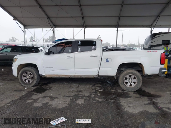 2019 Chevrolet Colorado 4WD Work Truck with VIN 1GCGTBEN8K1347983, listed as a IAAI auction lot 41923067 with 111,827 mi miles and . Bid and sale history available at DreamBid. Image 15.