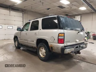 2004 GMC Yukon SLT with VIN 1GKEK13TX4J155865, listed as a IAAI auction lot 41758663 with 281,531 mi miles. Bid and sale history available at carsss.com. Image 3.