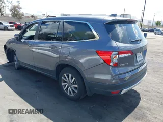 2021 Honda Pilot EX-L with VIN 5FNYF5H57MB046740, listed as a IAAI auction lot 41943366 with 31,198 mi miles and . Bid and sale history available at DreamBid. Image 3.