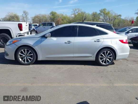 2015 Hyundai Azera z VIN KMHFG4JG0FA453994, wystawiony jako IAAI lot #42002922 z przebiegiem 102 094 mil mil oraz . Historia ofert i sprzedaży dostępna na DreamBid. Obrazek 14.