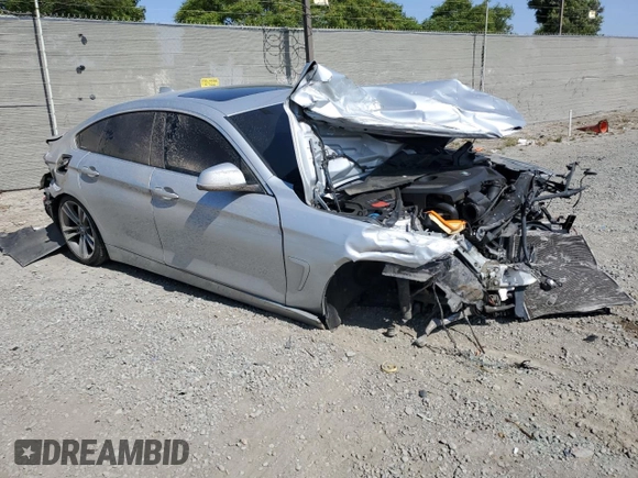 2018 BMW 4 Series 430i with VIN WBA4J1C55JBG75988, listed as a Copart auction lot 58623265 with 71,976 mi miles and Salvage title. Bid and sale history available at DreamBid. Image 4.