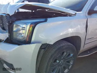 2016 GMC Yukon XL Denali with VIN 1GKS1HKJ7GR280505, listed as a IAAI auction lot 41694888 with 218,621 mi miles. Bid and sale history available at carsss.com. Image 6.