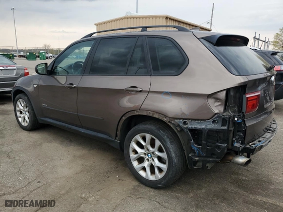 2011 BMW X5 35i with VIN 5UXZV4C5XBL411042, listed as a Copart auction lot 52900135 with 127,734 mi miles and Clean Title. Bid and sale history available at carsss.com. Image 2.