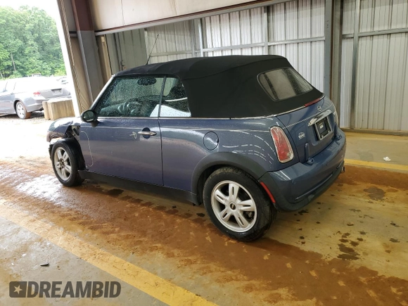 2005 MINI Convertible with VIN WMWRF33485TG10496, listed as a Copart auction lot 58582955 with 107,641 mi miles and Salvage title. Bid and sale history available at DreamBid. Image 2.