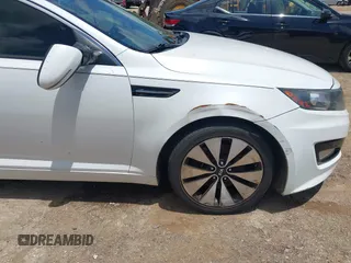2012 Kia Optima SX z VIN 5XXGR4A68CG002791, wystawiony jako IAAI lot #42531924 z przebiegiem 180 153 mil mil oraz . Historia ofert i sprzedaży dostępna na DreamBid. Obrazek 6.