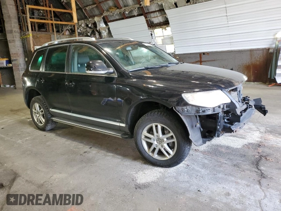 2010 Volkswagen Touareg VR6 with VIN WVGBF7A99AD002591, listed as a Copart auction lot 70624234 with 154,330 mi miles and Salvage Title. Bid and sale history available at DreamBid. Image 4.
