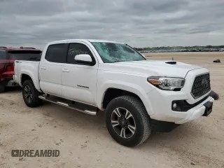 2018 Toyota Tacoma SR5 z VIN 5TFAZ5CNXJX065932, wystawiony jako Copart lot #52046845 z przebiegiem 61 980 mil mil oraz Szkoda całkowita • Salvage title. Historia ofert i sprzedaży dostępna na DreamBid. Obrazek 4.