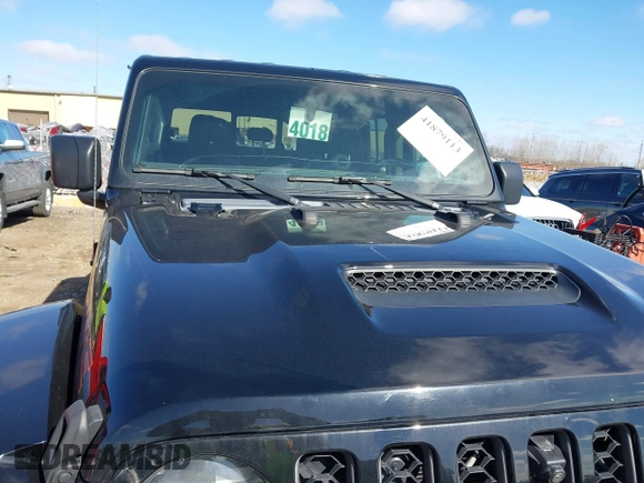 2021 Jeep Gladiator Mojave with VIN 1C6JJTEG9ML528964, listed as a IAAI auction lot 41879113 with 74,315 mi miles and . Bid and sale history available at DreamBid. Image 6.