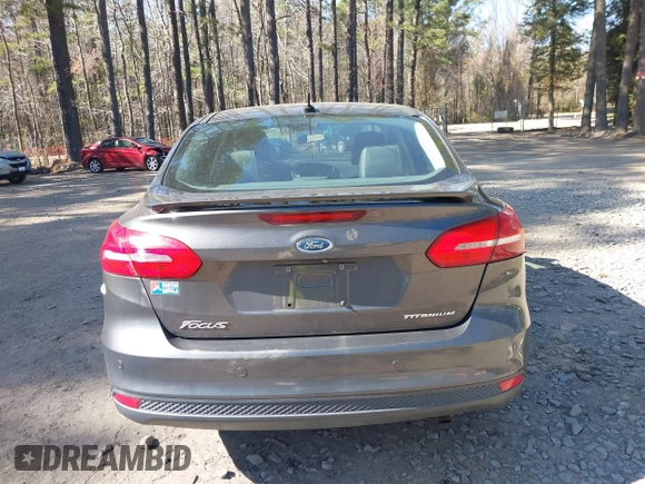 2015 Ford Focus Titanium with VIN 1FADP3J25FL333743, listed as a IAAI auction lot 41857057 with 120,917 mi miles and . Bid and sale history available at carsss.com. Image 17.