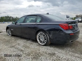 2015 BMW 7 Series 750Li with VIN WBAYE8C50FD781398, listed as a Copart auction lot 49519484 with 54,075 mi miles and Salvage Title. Bid and sale history available at carsss.com. Image 2.