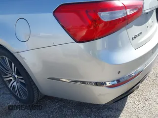 2015 Kia Cadenza Premium with VIN KNALN4D74F5173557, listed as a IAAI auction lot 41702351 with 104,087 mi miles and . Bid and sale history available at carsss.com. Image 20.