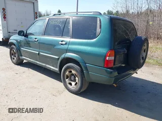 2002 Suzuki XL-7 Standard with VIN JS3TX92V124124409, listed as a IAAI auction lot 42166017 with 194,418 mi miles. Bid and sale history available at carsss.com. Image 3.