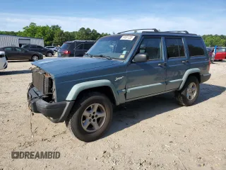 1998 Jeep Cherokee Sport z VIN 1J4FJ68S6WL283022, wystawiony jako Copart lot #57451125 z przebiegiem 207 618 mil mil oraz Szkoda całkowita • Salvage title. Historia ofert i sprzedaży dostępna na DreamBid. Obrazek 1.