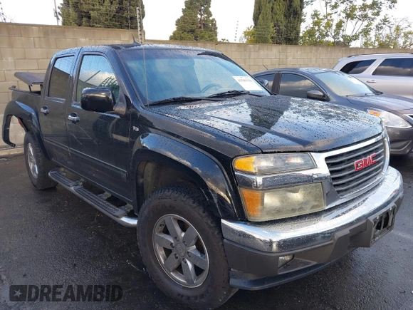 2010 GMC Canyon z VIN 1GTJSFDP6A8134412, wystawiony jako IAAI lot #41589150 z przebiegiem 164 232 mil mil oraz . Historia ofert i sprzedaży dostępna na DreamBid. Obrazek 1.