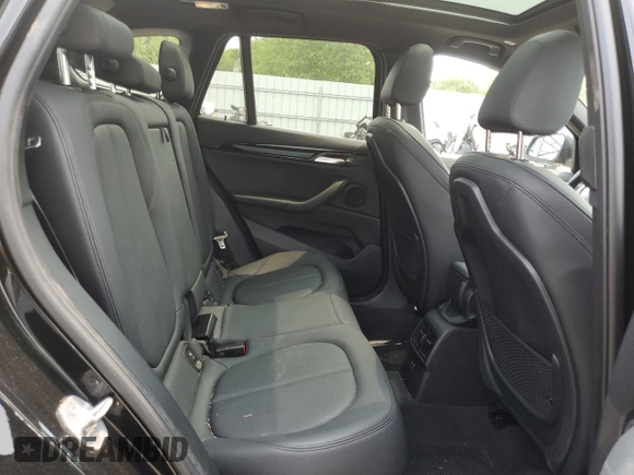 2018 BMW X1 xDrive28i with VIN WBXHT3C36J3H29952, listed as a Copart auction lot 59679285 with 75,220 mi miles and Salvage title. Bid and sale history available at DreamBid. Image 11.