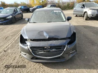 2017 Mazda 3 Touring with VIN JM1BN1V72H1104811, listed as a Copart auction lot 77165364 with 122,909 mi miles and Salvage Title. Bid and sale history available at DreamBid. Image 5.