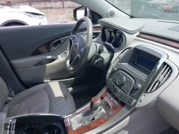 2011 Buick LaCrosse CXL with VIN 1G4GC5EDXBF259122, listed as a IAAI auction lot 42525029 with 154,529 mi miles and . Bid and sale history available at DreamBid. Image 5.