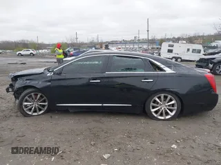 2014 Cadillac XTS Luxury with VIN 2G61M5S36E9248122, listed as a IAAI auction lot 42012167 with 188,458 mi miles and . Bid and sale history available at DreamBid. Image 13.
