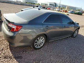 2012 Toyota Camry XLE z VIN 4T1BD1FK8CU048172, wystawiony jako Copart lot #51941205 z przebiegiem 186 001 mil mil oraz Szkoda całkowita • Salvage title. Historia ofert i sprzedaży dostępna na DreamBid. Obrazek 3.