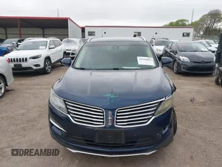 2015 Lincoln MKC z VIN 5LMCJ1A92FUJ36590, wystawiony jako IAAI lot #42130054 z przebiegiem 121 681 mil mil oraz . Historia ofert i sprzedaży dostępna na DreamBid. Obrazek 13.
