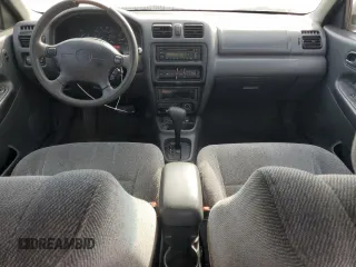 1998 Mazda Protege DX z VIN JM1BC1416W0194406, wystawiony jako Copart lot #44535955 z przebiegiem 312 942 mil mil oraz Szkoda całkowita • Salvage title. Historia ofert i sprzedaży dostępna na DreamBid. Obrazek 8.