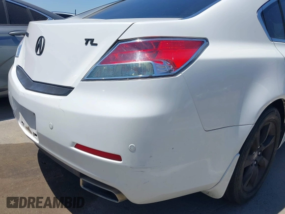 2012 Acura TL Auto z VIN 19UUA8F24CA012089, wystawiony jako IAAI lot #42238176 z przebiegiem 217 136 mil mil oraz . Historia ofert i sprzedaży dostępna na DreamBid. Obrazek 18.