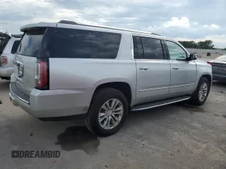 2020 GMC Yukon XL Denali with VIN 1GKS2HKJ4LR201038, listed as a Copart auction lot 66917904 with 99,944 mi miles and Salvage Title. Bid and sale history available at carsss.com. Image 3.