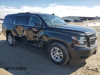 2020 Chevrolet Suburban LS with VIN 1GNSCGKC9LR126672, listed as a Copart auction lot 43216245 with 132,775 mi miles and Salvage title. Bid and sale history available at DreamBid. Image 4.