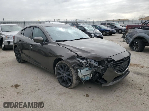 2014 Mazda 3 S Touring with VIN JM1BM1V31E1105847, listed as a Copart auction lot 50045925 with 121,538 mi miles and Salvage Title. Bid and sale history available at DreamBid. Image 4.