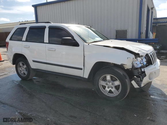 2007 Jeep Grand Cherokee Laredo with VIN 1J8HS48P37C626360, listed as a Copart auction lot 42608185 with 129,715 mi miles and Salvage Title. Bid and sale history available at carsss.com. Image 4.