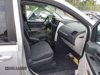 2009 Dodge Grand Caravan SXT z VIN 2D8HN54139R615585, wystawiony jako IAAI lot #42334638 z przebiegiem 129 672 mil mil oraz . Historia ofert i sprzedaży dostępna na DreamBid. Obrazek 5.