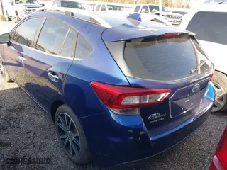 2017 Subaru Impreza Limited with VIN 4S3GTAU61H3748390, listed as a IAAI auction lot 40931014 with 135,929 mi miles. Bid and sale history available at carsss.com. Image 3.