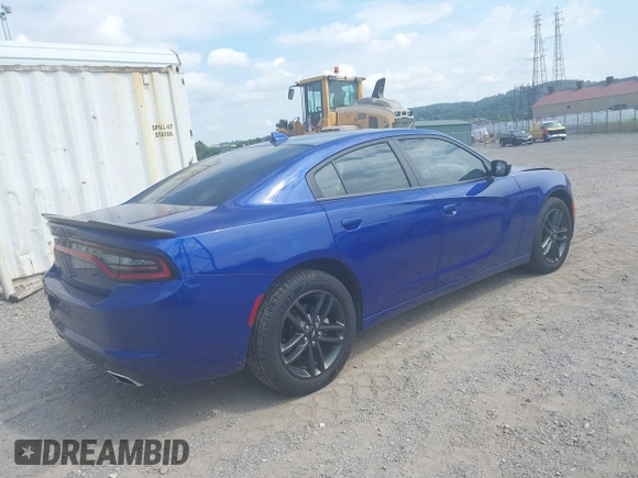 2019 Dodge Charger SXT with VIN 2C3CDXJG4KH550424, listed as a IAAI auction lot 40224159 with 56,988 mi miles and . Bid and sale history available at DreamBid. Image 4.