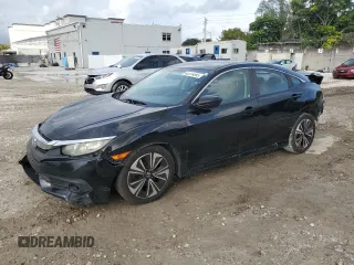 2016 Honda Civic Sedan EX-T with VIN 2HGFC1F34GH639305, listed as a Copart auction lot 42014895 with 118,361 mi miles and Salvage Title. Bid and sale history available at carsss.com. Image 1.