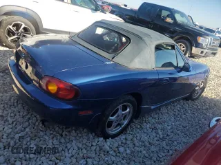 1999 Mazda MX-5 Miata with VIN JM1NB3532X0134801, listed as a Copart auction lot 83838374 with 97,015 mi miles and Salvage title. Bid and sale history available at DreamBid. Image 3.