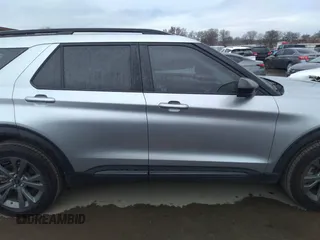 2022 Ford Explorer XLT z VIN 1FMSK8DH7NGB83988, wystawiony jako IAAI lot #41351547 z przebiegiem 60 668 mil mil oraz . Historia ofert i sprzedaży dostępna na DreamBid. Obrazek 13.