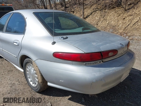 1999 Mercury Sable LS z VIN 1MEFM53S7XA622932, wystawiony jako IAAI lot #41708531 z przebiegiem 155 702 mil mil oraz . Historia ofert i sprzedaży dostępna na DreamBid. Obrazek 12.