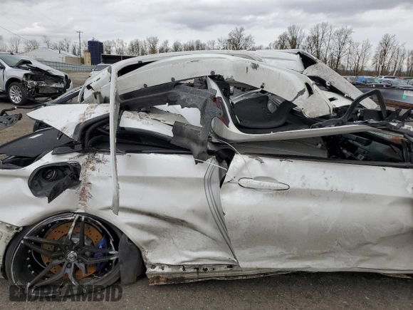 2015 BMW M4 z VIN WBS3U9C57FP967999, wystawiony jako Copart lot #47906424 z przebiegiem Nie podano mil oraz Szkoda całkowita • Salvage title. Historia ofert i sprzedaży dostępna na DreamBid. Obrazek 10.