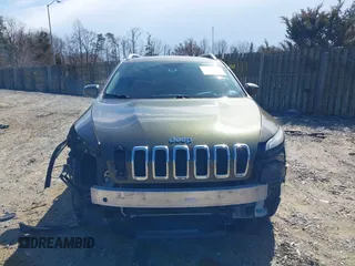 2014 Jeep Cherokee Latitude with VIN 1C4PJMCS5EW201462, listed as a IAAI auction lot 41727379 with 170,958 mi miles and . Bid and sale history available at DreamBid. Image 13.
