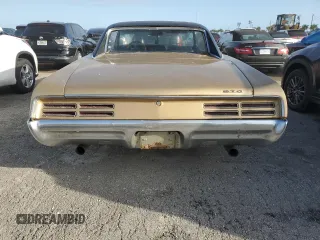 1967 Pontiac GTO z VIN 242177P108834, wystawiony jako Copart lot #74698414 z przebiegiem 230 374 mil mil oraz Szkoda całkowita • Salvage title. Historia ofert i sprzedaży dostępna na DreamBid. Obrazek 6.