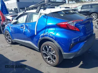 2019 Toyota C-HR XLE with VIN JTNKHMBX5K1043079, listed as a IAAI auction lot 41813367 with 77,879 mi miles and . Bid and sale history available at DreamBid. Image 3.